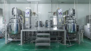 Stainless steel vacuum emulsifier production line in clean pharmaceutical cosmetic manufacturing workshop